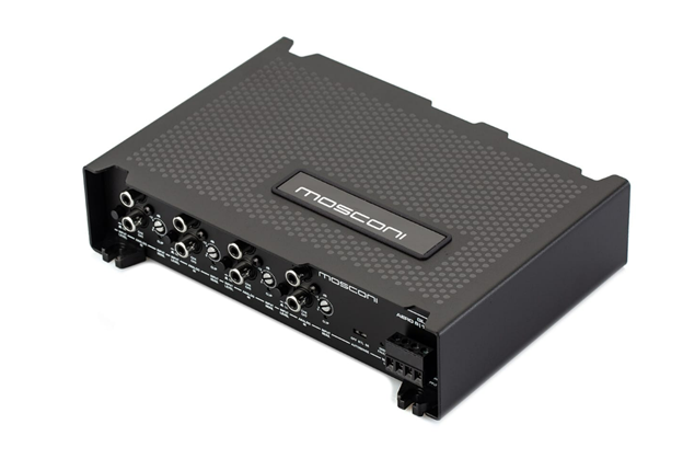  Front-angled view of a Mosconi Gladen AERO 8|12 DSP (Digital Signal Processor) for car audio, showing the black aluminum chassis and input connection panel.